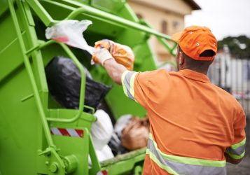 One mans trash...Cropped shot of a garbage collection worker